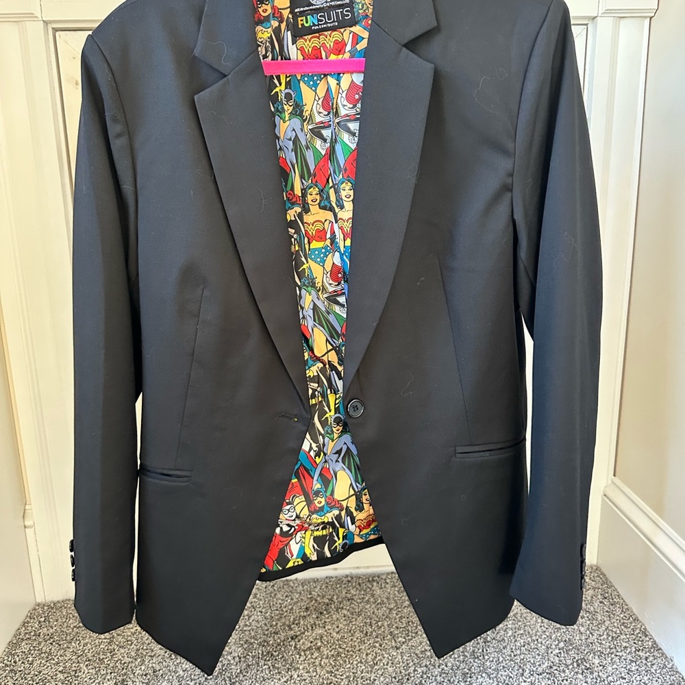 Women’s black blazer with a fun twist on the inside